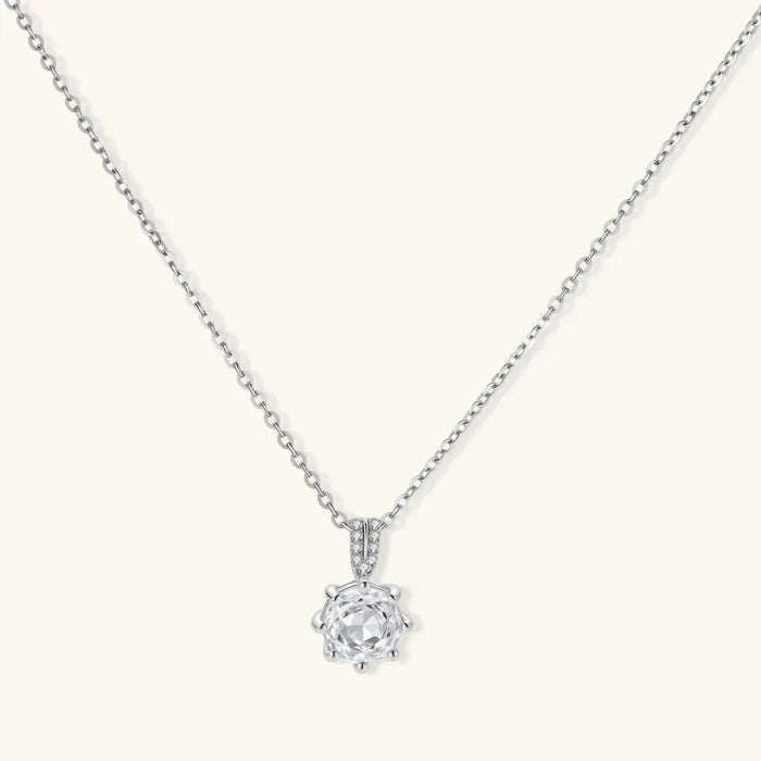 Crystal Clarity Clear-Stone Pendant Necklace with a clear round faceted stone, silver eight-prong setting and pavé-accented bail