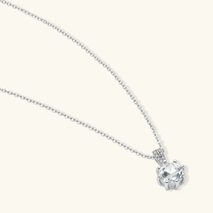 Crystal Clarity Clear-Stone Pendant Necklace with a silver-tone chain, round faceted clear stone and pavé-accented bail