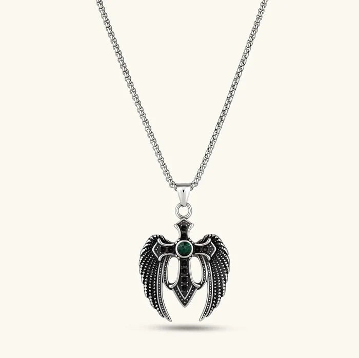 Dark Angel Wing Cross Necklace in antiqued silver with sculpted black wings, a cross, and a green center stone