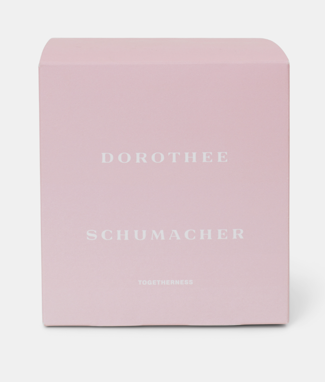 Dorothee Schumacher Togetherness candle in 230g glass jar, home decor with elegant design and branding visible in the image.