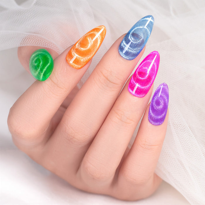 Double-ended magnet pen creating cat eye effect on green gel polish circular crescent pattern professional nail art