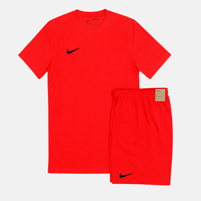 Red Nike athletic shirt and shorts set on a white background
