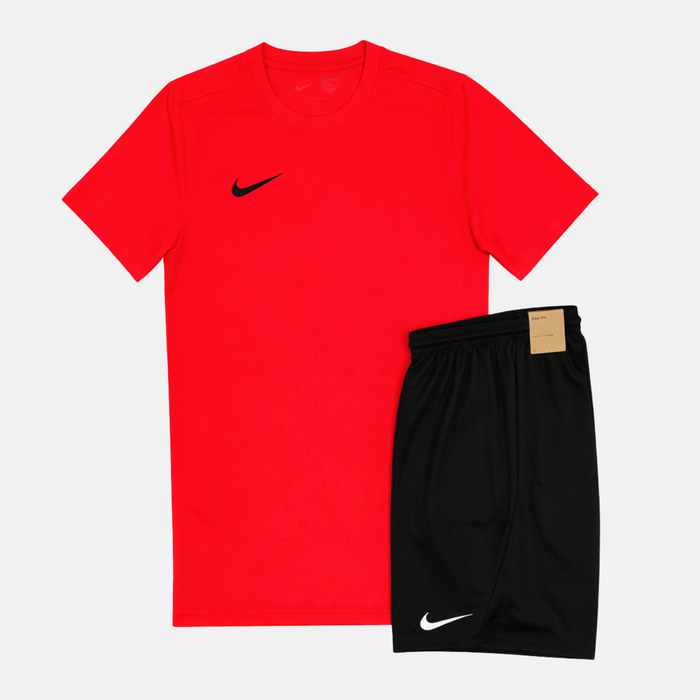 Red t-shirt with Nike logo and black shorts on a white background