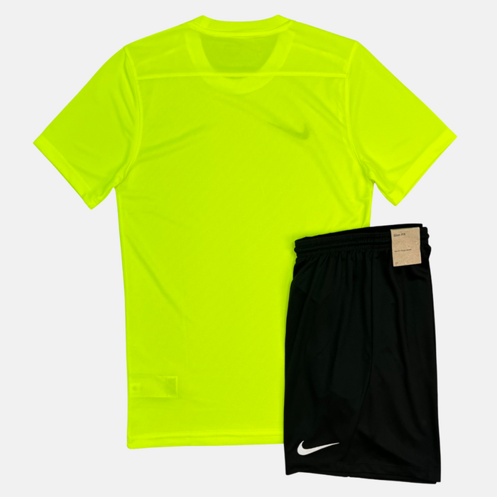 Yellow t-shirt and black shorts with Nike logos on a white background