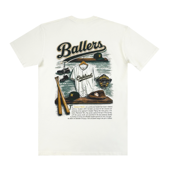 The Dugout Tee by Oakland Ballers is a white shirt with illustrated team gear—jersey, bats, gloves, cap, cleats, and diamond—plus bold “Ballers” script celebrating the spirit of the Oakland Ballers pro baseball team.