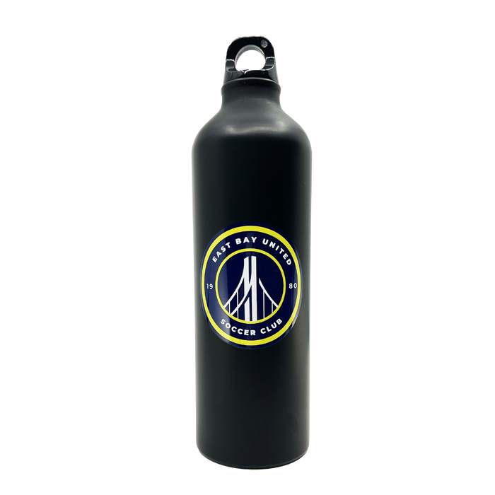 The EBU Water Bottle by Supported Brands is a tall, black water bottle with a screw-top lid. It features a circular logo with the text "East Bay United Soccer Club" encircling a stylized bridge design. Representing the youth soccer club established in 1980, this bottle showcases team spirit and community pride.