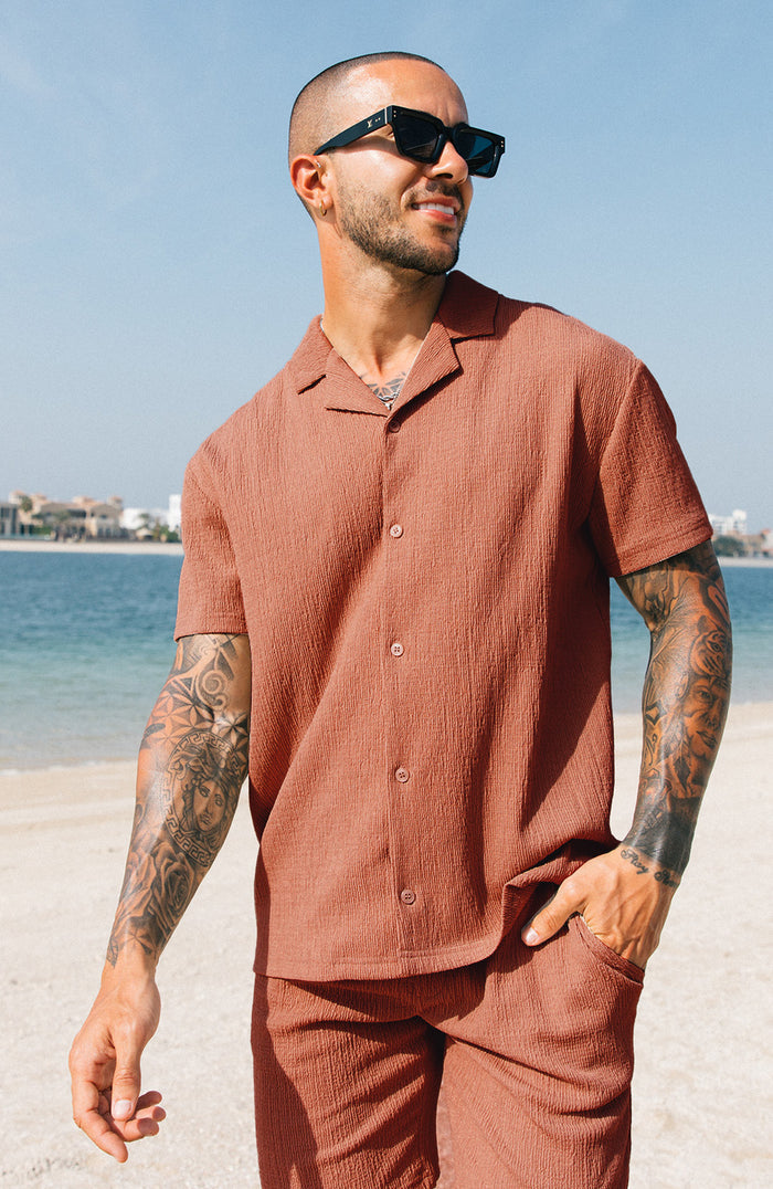 Model is 5'10 wearing size Medium