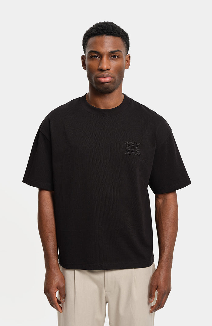 Embossed Monogram Back Logo T Shirt In Black