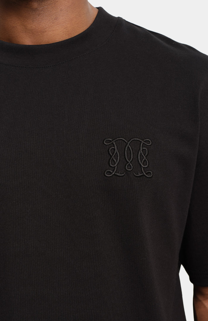 Embossed Monogram Back Logo T Shirt In Black