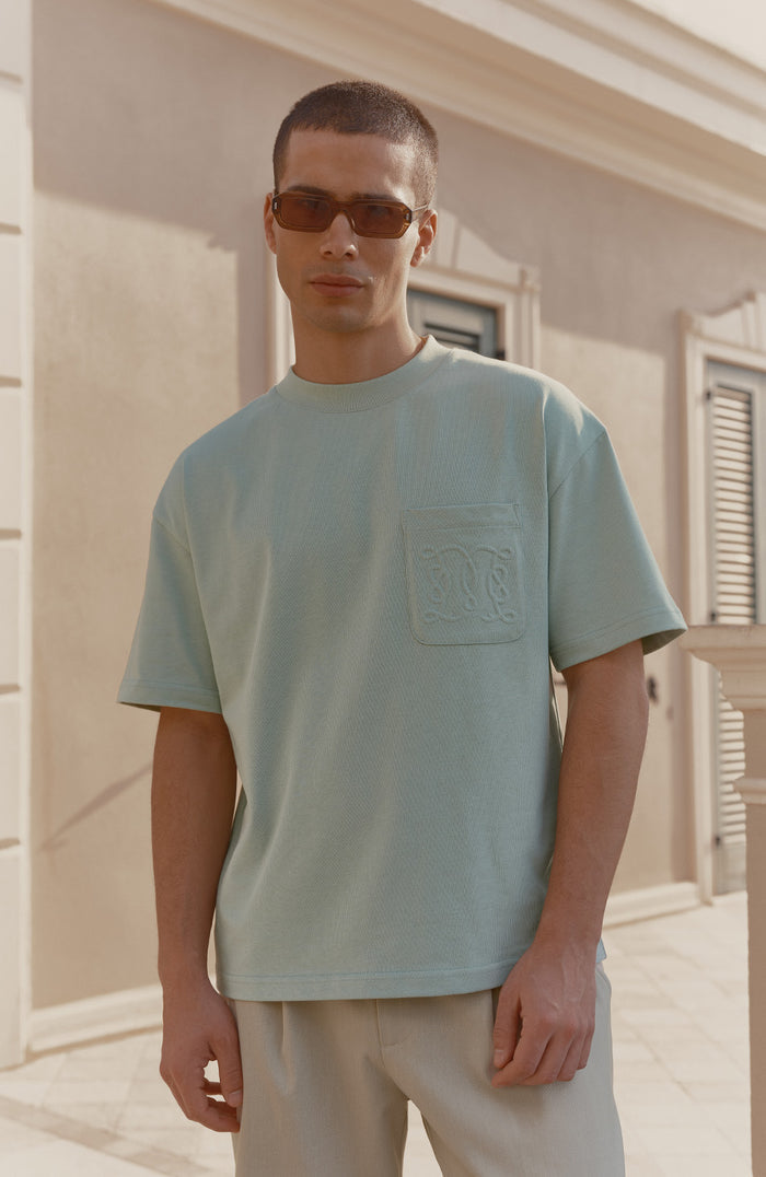 Model is 6'0, chest 39.5", wearing size M