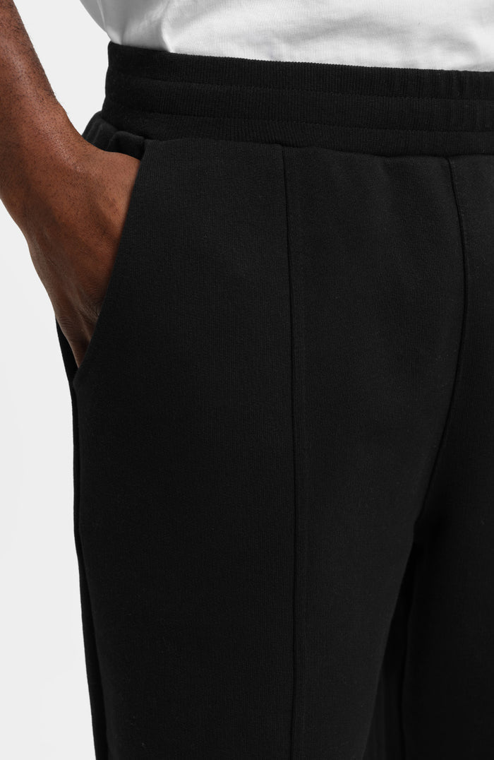 Embroidered Monogram Wide Leg Joggers In Black