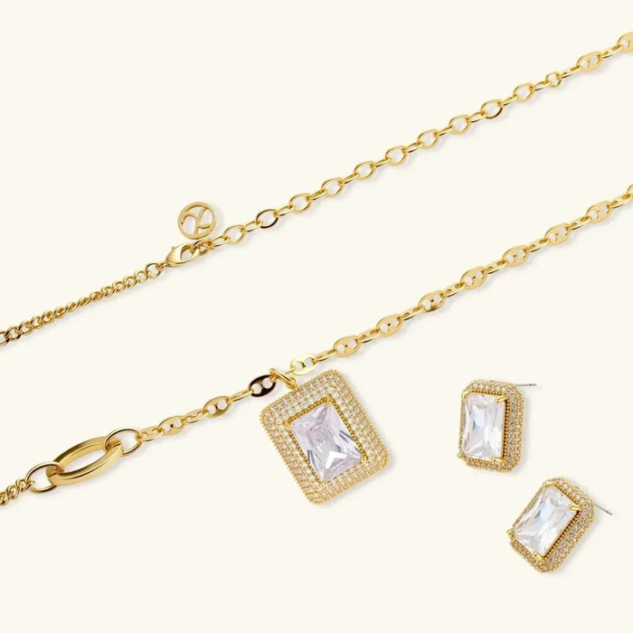Emerald-Cut Zirconia Halo Necklace set with gold-tone chains, a clear rectangular pendant and matching halo stud earrings