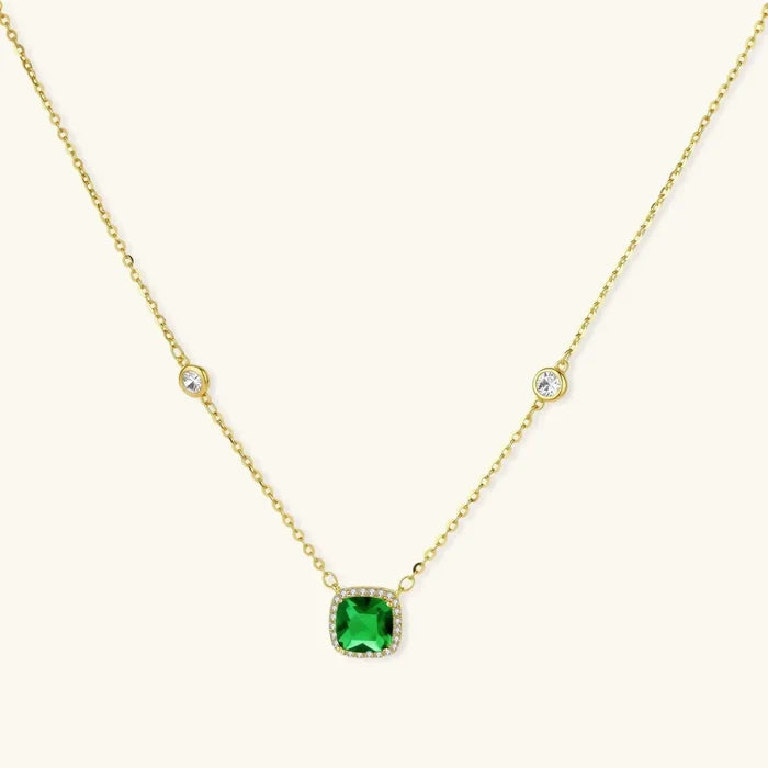 Pendant necklace in 14K gold-plated 925 sterling silver with a square green gemstone, clear halo, and crystal chain accents