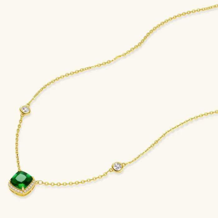 14K gold-plated 925 sterling silver necklace with a green cushion-cut pendant, clear halo stones and crystal chain accents
