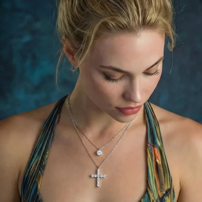 Faith & Light Moissanite Layered Necklace Set in polished silver, with a round solitaire pendant and a sparkling cross pendant