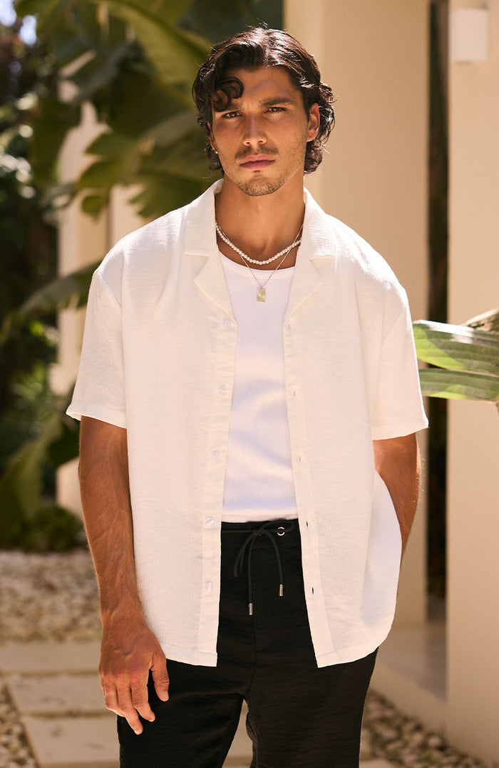 Model is 5'11 with size S chest, wearing size S