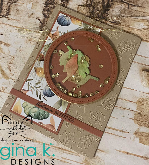 Gina K. Designs - Embossing Folder - Falling Leaves. The embossing folders create deeply etched designs for a truly dimensional effect. They can also be used for a verity of fun cardmaking techniques. Embossing folders measure 5 x 7 inches. Available at Embellish Away located in Bowmanville Ontario Canada.