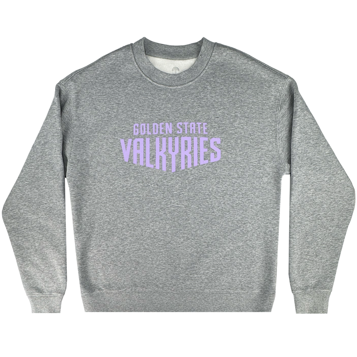 The GSV Golden State Valkyries Circle Lock Up Crew is a heather gray heavyweight fleece crewneck with bold, light purple “GOLDEN STATE VALKYRIES” text in modern, blocky font centered on the chest and shown flat on a white background.