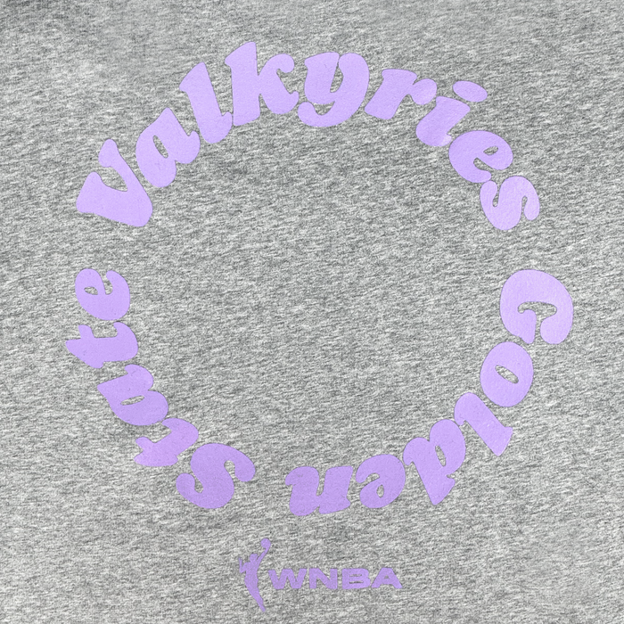 The GSV Golden State Valkyries Circle Lock Up Crew is a heather gray heavyweight fleece sweatshirt with lavender circular "Golden State Valkyries" text, the WNBA logo, and "WNBA" below in matching lavender.