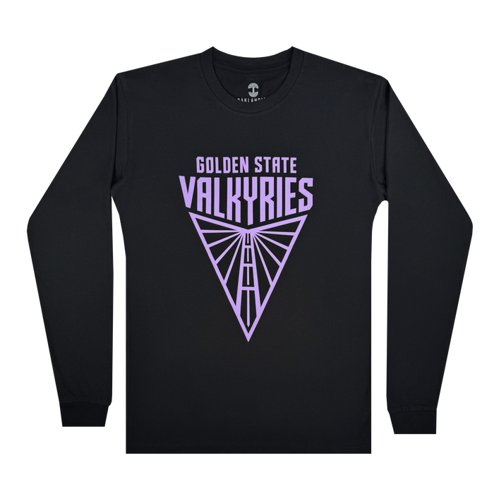 The Golden State Valkyries Primary LS Tee by GSV is a classic fit black long-sleeve T-shirt with "Golden State Valkyries" in bold purple text above a geometric triangular wing design on the chest, complete with ribbed cuffs for style and comfort.