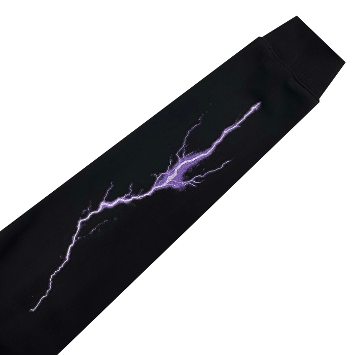 The GSV Golden State Valkyries Violet Lightning Hoodie features a black mid-weight fleece with a bold, jagged purple lightning bolt across the front, creating striking contrast against the white background and making the vibrant design stand out.