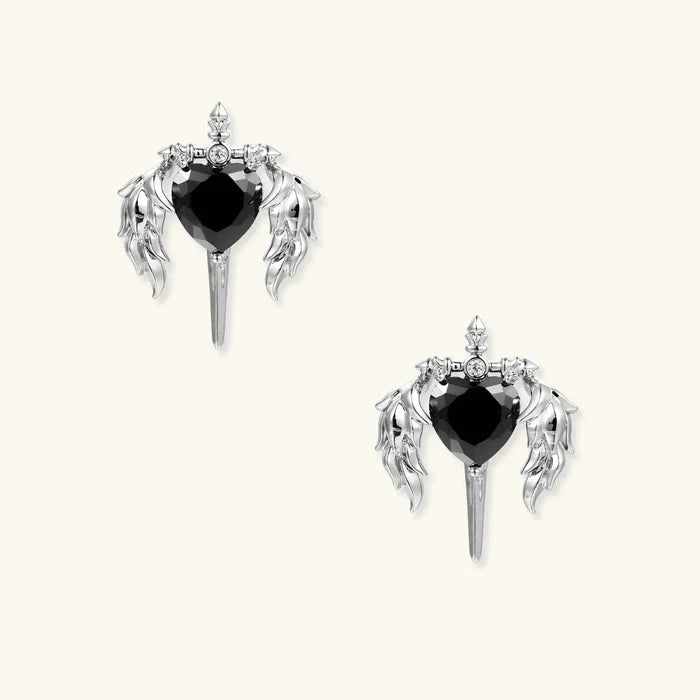 Gothic Black Heart stud earrings in polished silver-tone metal, with black heart stones, clear accents, wing details and dagger drops