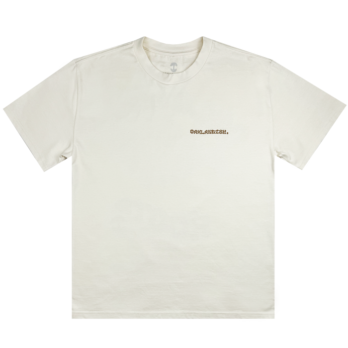 The Grow Your Roots Heavy Tee by Oaklandish is showcased against a white background. This plain, heavyweight combed cotton T-shirt features "DARK ACADEMIA" in small, dark letters over the left chest area. Designed with a round neckline and short sleeves, this men's sizing shirt maintains a simple, classic style that's enduringly stylish.