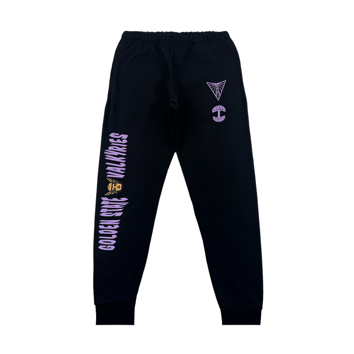 The GSV Renowned Pant by GSV is a black fleece sweatpant with cuffed ankles, purple graphics and text reading "GOLDEN STATE VALKYRIES WALL WARES," abstract symbols, and a yellow mask design on the left leg and right hip.