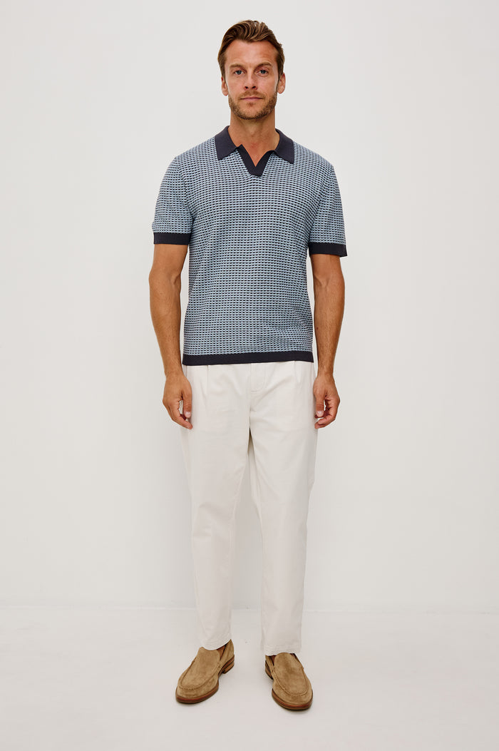 Hayden Polo Shirt in Lightweight Cotton With Split V-Neck Collar, Short Sleeves, and Classic Fit in Blue Lagoon Ripple Colorway - Full Body Front View Featured on Model