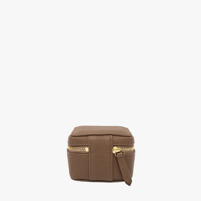 Back of STOW London's Hester Jewellery Case in Mocha pebbled leather on a light grey background featuring a YKK Natulon zip