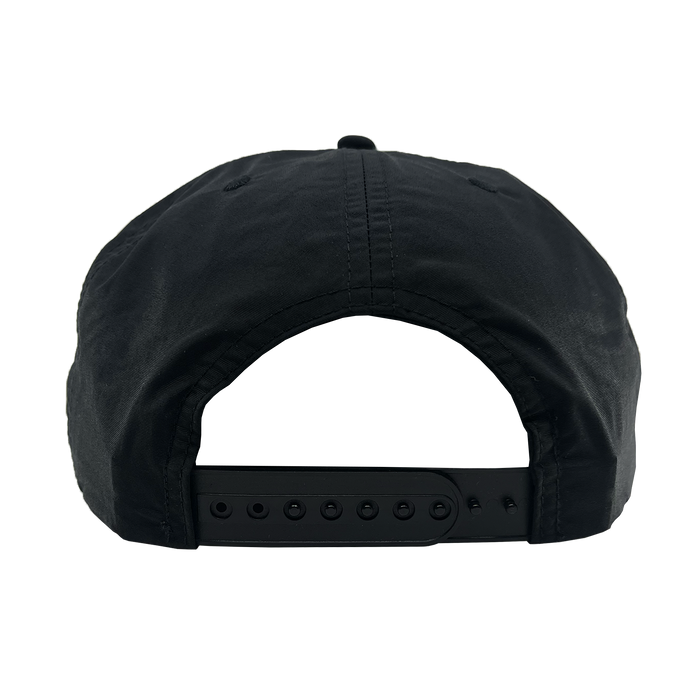 The Other Hiero Classic Camo Logo Hat is a black snapback cap shown from the back with an adjustable plastic closure, visible stitching, eyelets on top, and a classic hip-hop vibe against a plain white background.