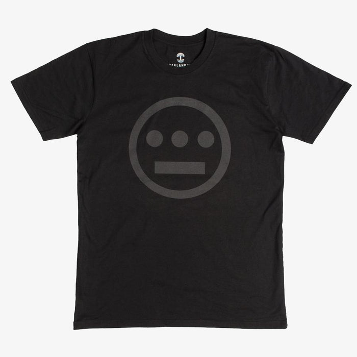 The Hieroglyphics Hiero Classic Logo Tee is a black T-shirt that showcases a subtle, dark gray logo of an outlined circle containing a horizontal line above three dots, resembling a hieroglyphic face. The logo is centrally placed on the chest area. This hip-hop-inspired T-shirt features a crew neck and short sleeves.