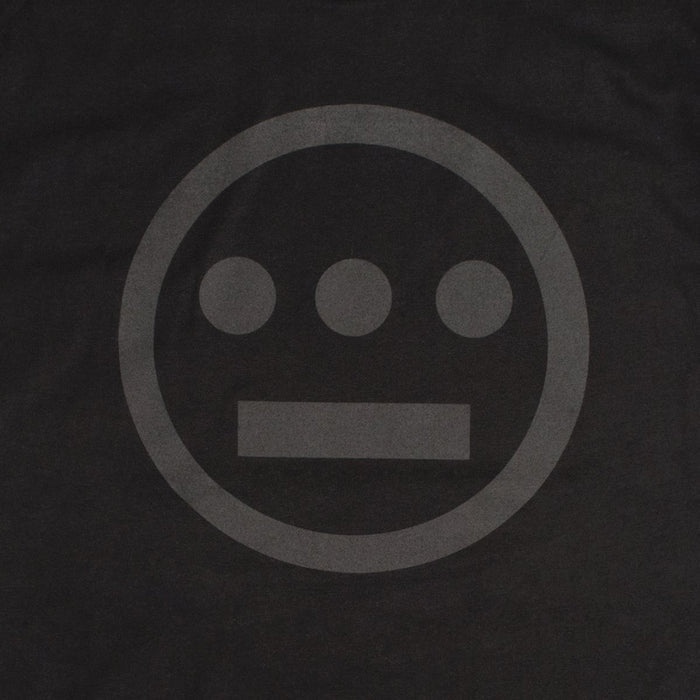 The Hiero Classic Logo Tee by Hieroglyphics features a minimalist grayscale design on a black background. The design consists of three small filled circles lined horizontally above a short, thick horizontal bar, all enclosed within a larger circle. The elements resemble modern hieroglyphics subtly shaded against the dark backdrop, making it perfect for a t-shirt.