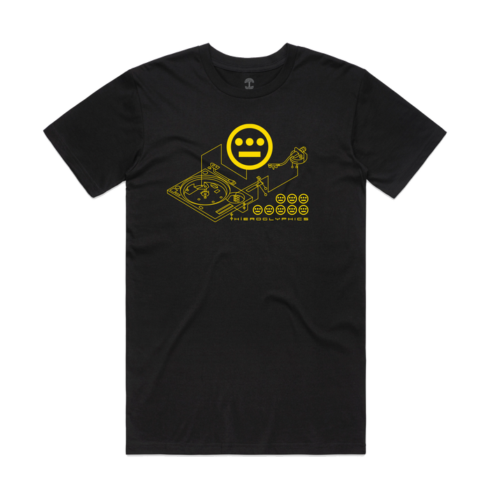 The Hiero Turntable Tee by Hieroglyphics is a black T-shirt adorned with a yellow geometric illustration of a turntable and a stylized smiling face. Capture the hip-hop vibe with "Hieroglyphics" and circular symbols below, making this tee essential for music enthusiasts.