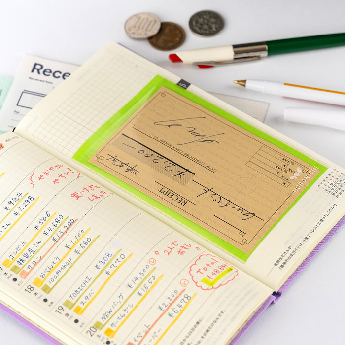 Hobonichi planner with stationery supplies and accessories