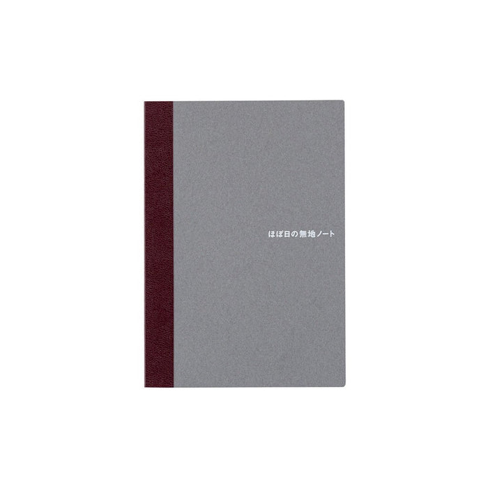Gray A6 notebook on white background