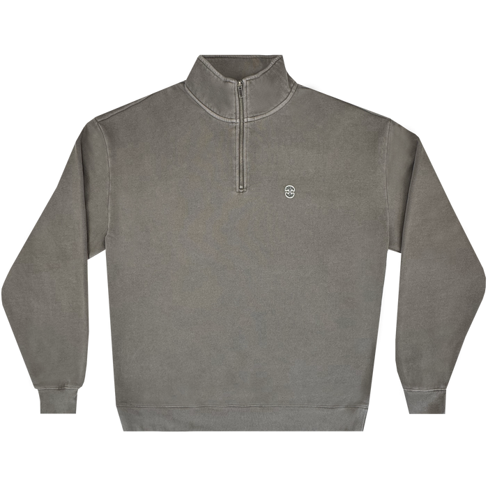 The Oaklandish Hojicha 1/4 Zip is a faded gray men's fleece pullover with garment dye, high collar, ribbed cuffs and hem, and a small white embroidered "SC" logo on the left chest. Shown mid-weight against a plain white background.
