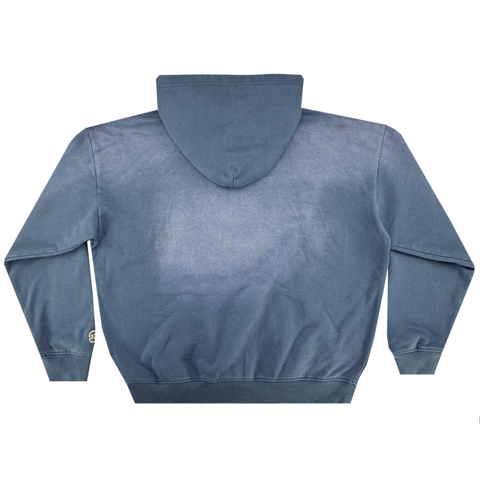 The Homage Hoodie by Oaklandish is laid flat, back facing up. Made from 100% cotton, it has long sleeves with ribbed cuffs and hem, a small circular tag on the left sleeve near the cuff, and soft, gently faded blue fabric.