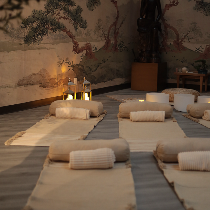 NOURISH: A Women's Wellness Conversation, Breathwork & Sound Journey setting with mats and calming decor.