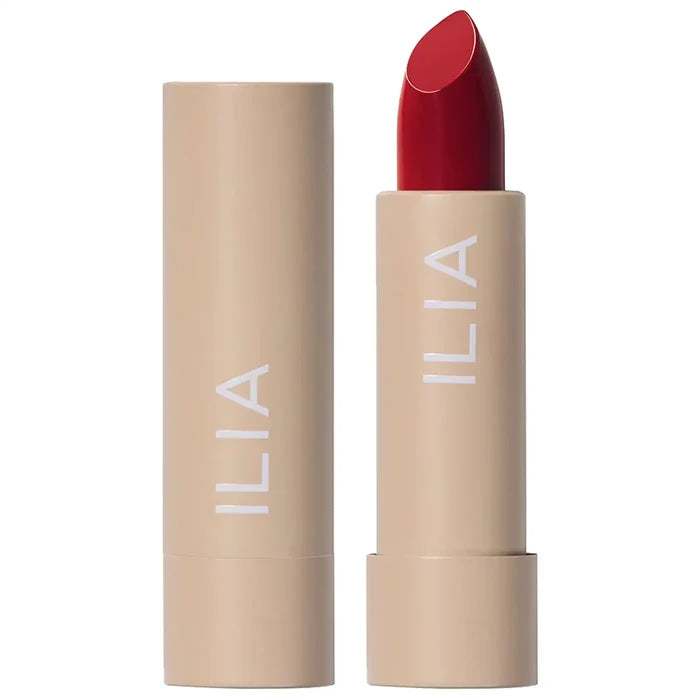 Ilia Color Block High Impact Lipstick in various shades, showing vibrant lipstick tubes with colorful packaging and product details.