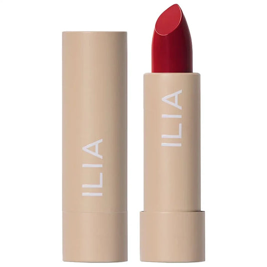 Ilia Color Block High Impact Lipstick in various shades, showing vibrant lipstick tubes with colorful packaging and product details.