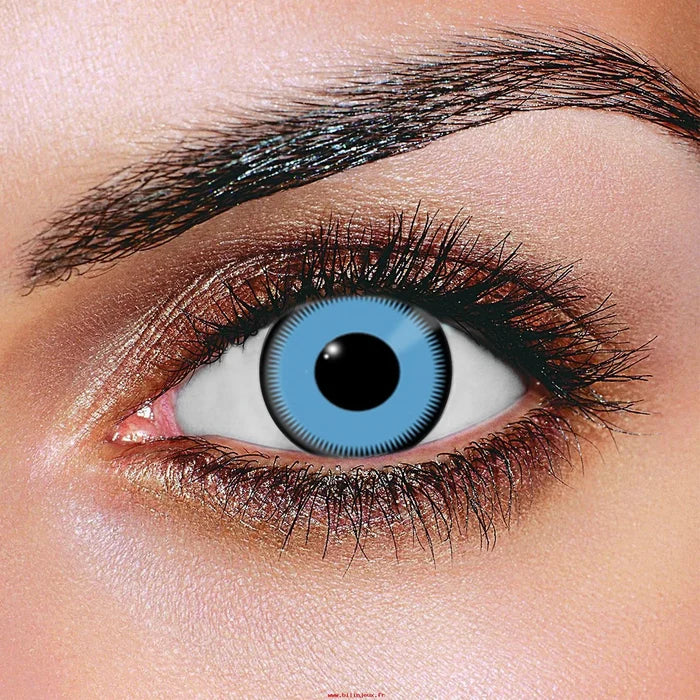 Zoomed in shot of an electric blue contact lens worn on a female's eye