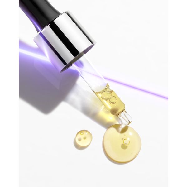 Institut Esthederm Retinol+ Oil Serum in a 15ml dropper bottle, showcasing a clear serum with a dropper for skincare application.