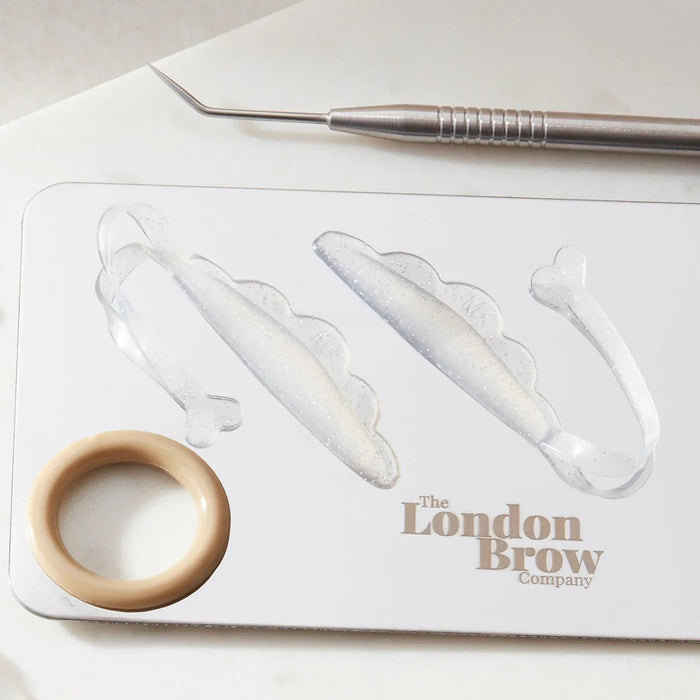 Clear glitter lash lift shields with silicone ribbon grip
