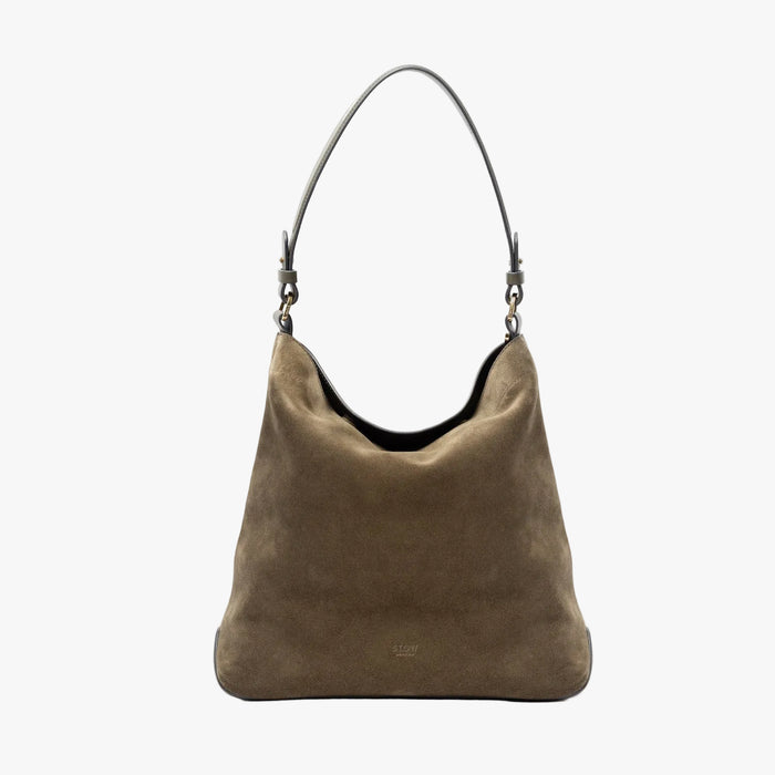 STOW London's Curve in Dark Green suede leather on a light grey background featuring the detachable shoulder strap with gold hardware