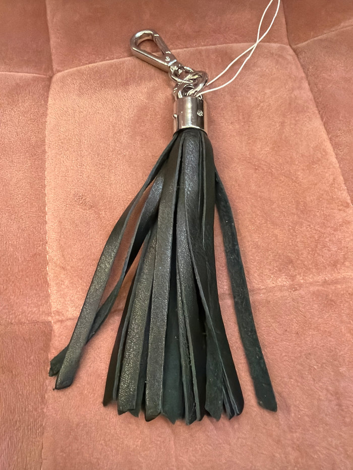 Leather tassel keychain by ili New York featuring a stylish leather tassel attached to a metal keyring.