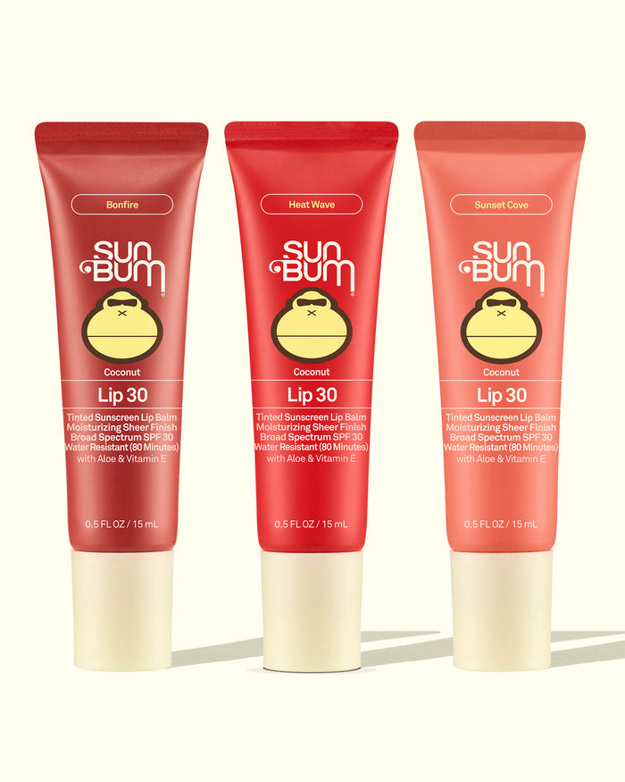 Sun Bum Lip 30 Trio tinted lip balms in Bonfire, Heat Wave, and Sunset Cove shades with SPF 30 protection.