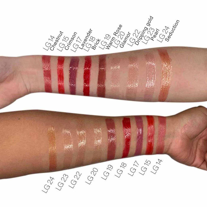 Lip Gloss - Clear shown as glossy swatches on two arms, ranging from sheer shimmer to deep red, pink, and bronze shades