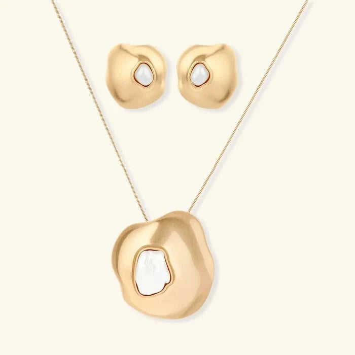 Liquid Art Sculptural Necklace set with gold-tone organic rippled pendants and studs, each with an ivory inset