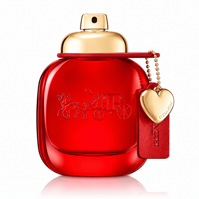 Coach Love EDP red glass perfume bottle with gold spray top, chain, heart charm, and branded red tag